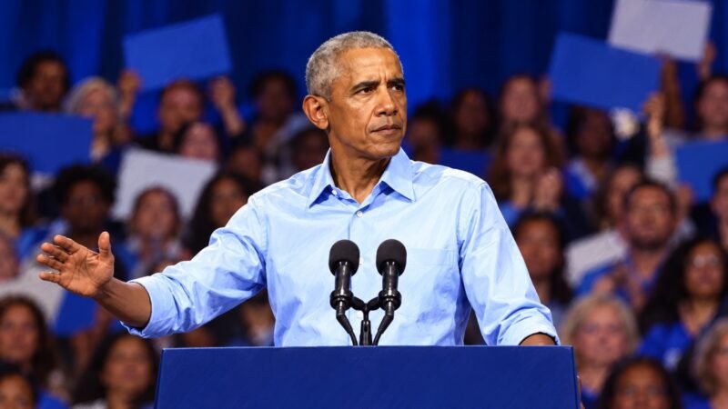 AI-assisted editorial illustration of Barack Obama in a light blue shirt speaking at microphones, representing his Cleveland campaign rally.